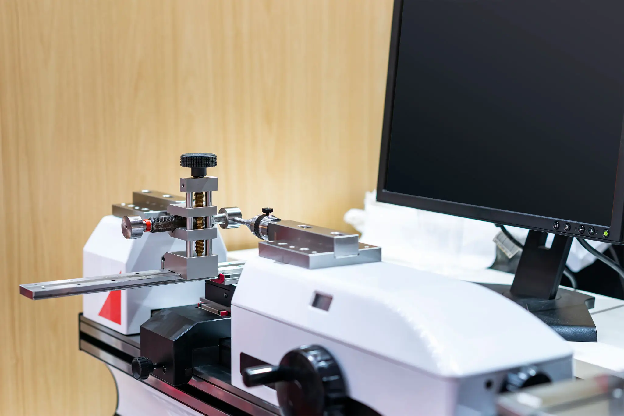Precision measuring instruments set up in a lab environment.